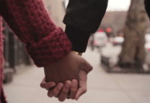 Black couple holding Hands